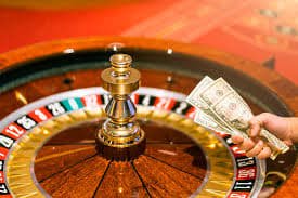 Jewels of Prosperity grid-based slot interface with cascading gem symbols